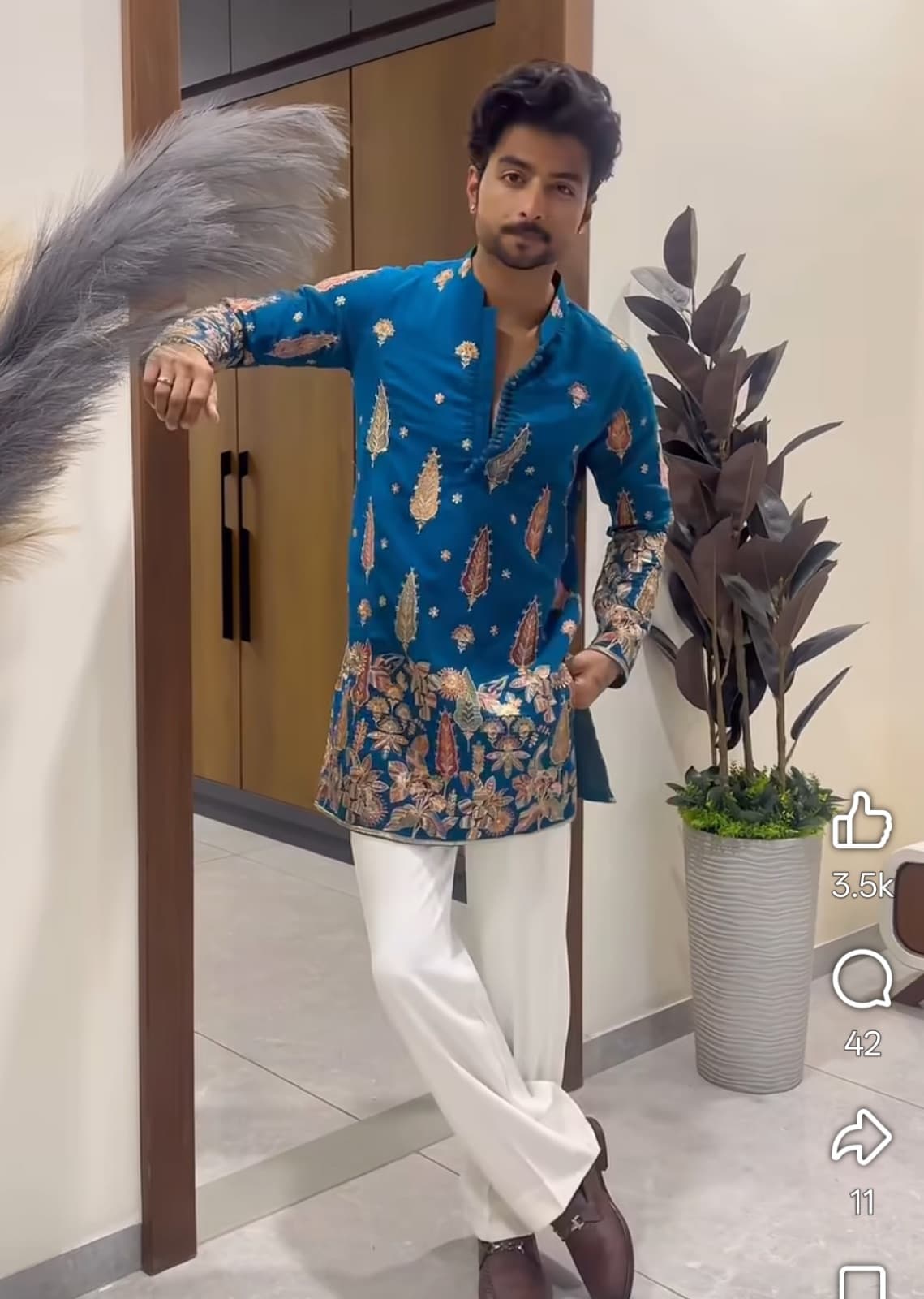 Teal embroidered kurta with ivory pants