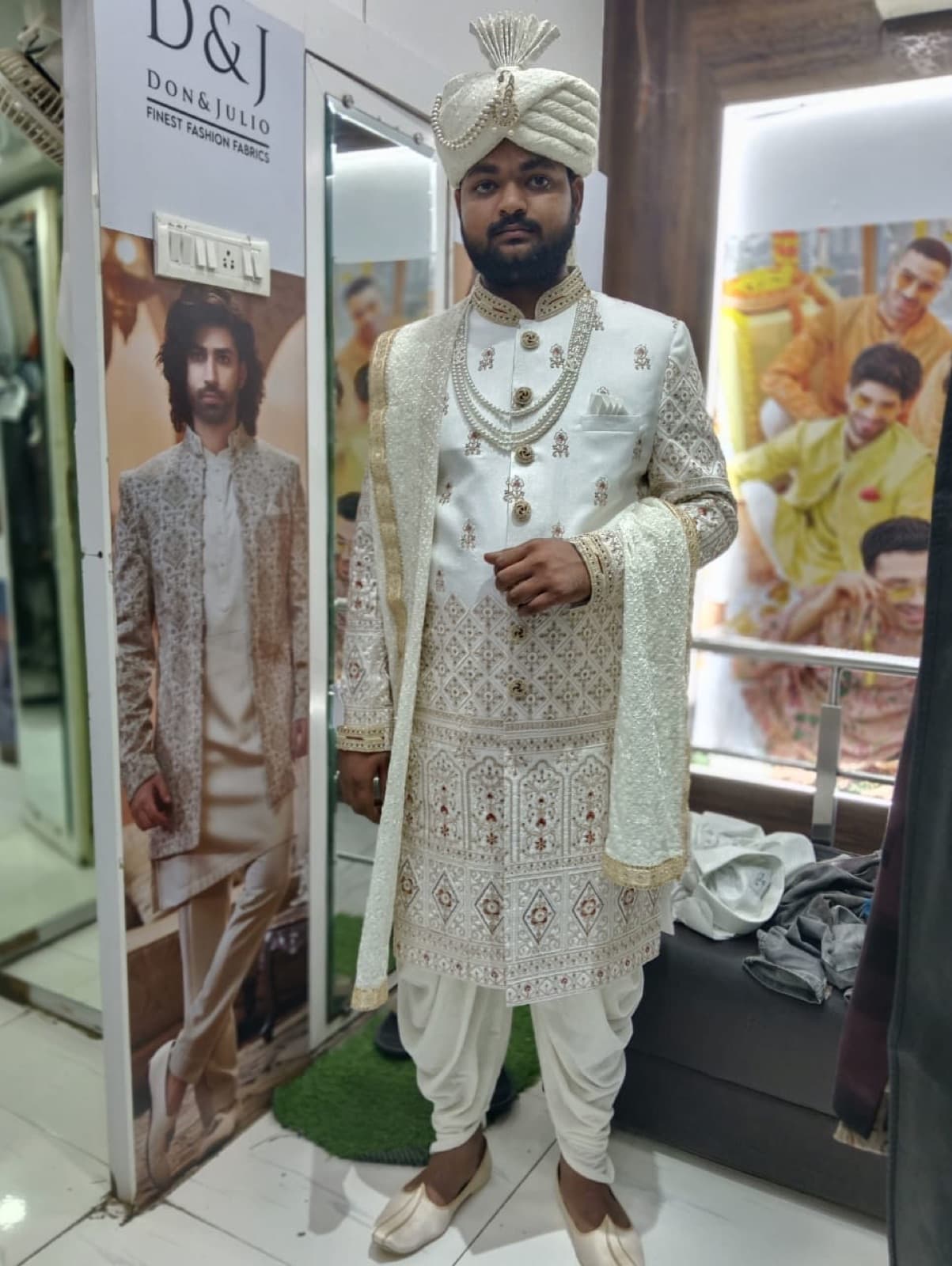 Groom in ivory sherwani with safa and pearl mala