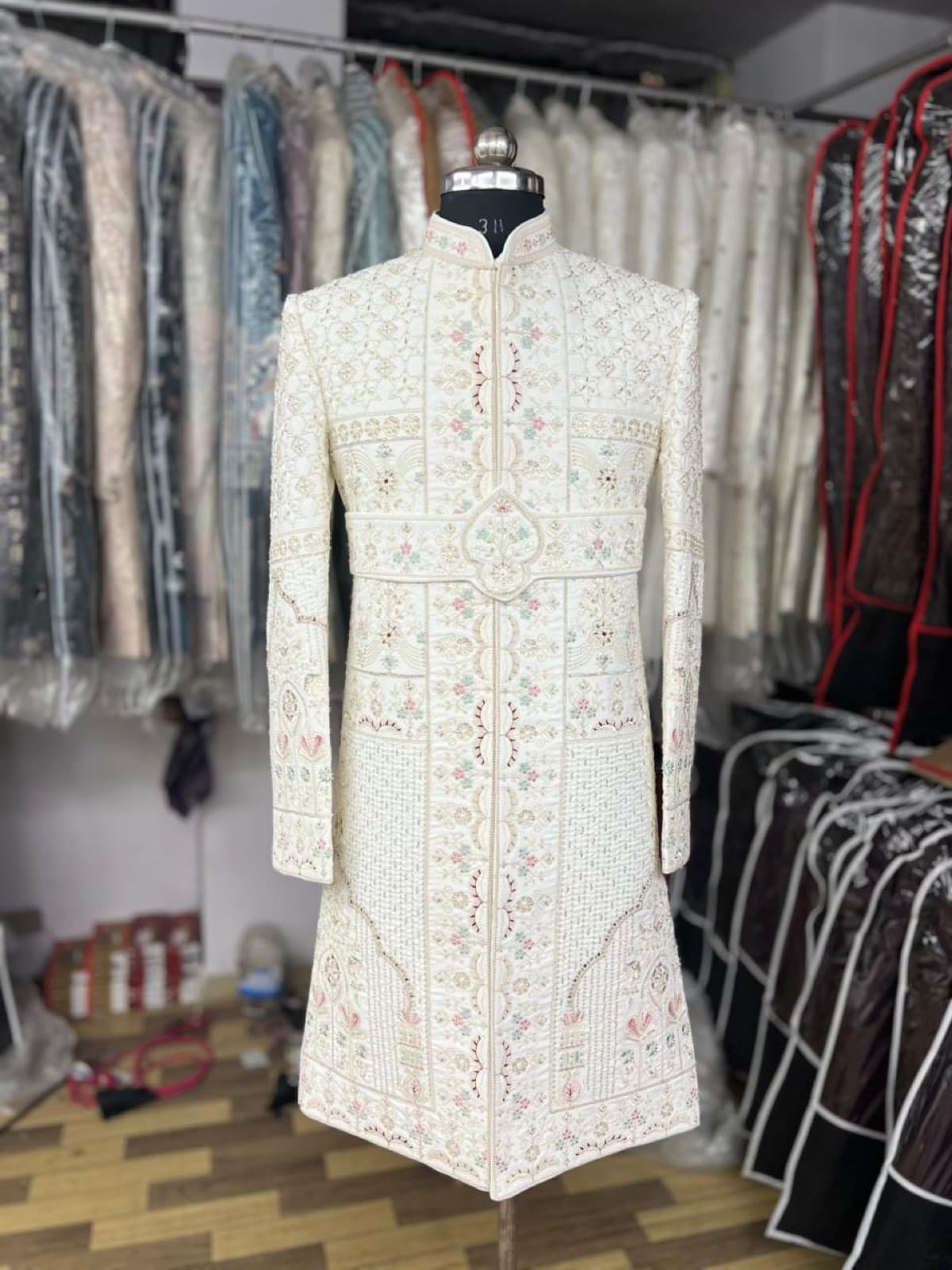 Ivory sherwani with dense threadwork